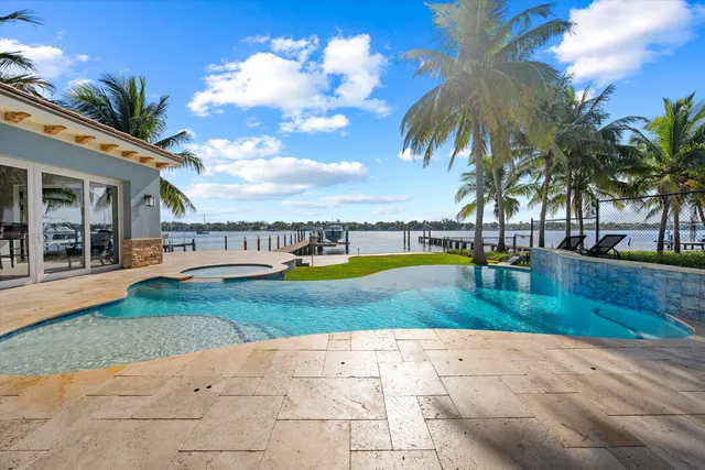 a view of a swimming pool with a garden