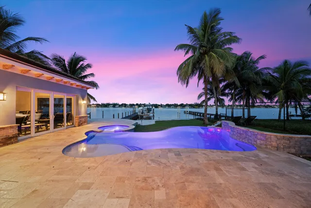 a view of outdoor space with swimming pool and lounge chair