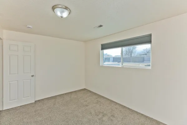 an empty room with a window