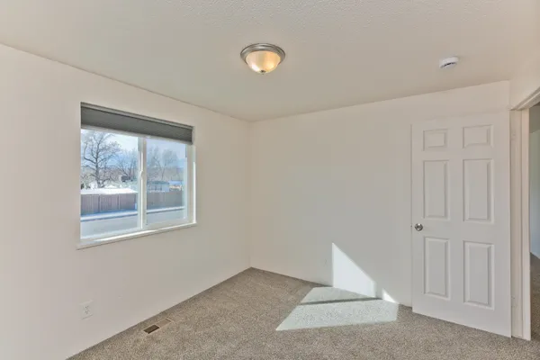 an empty room with a window