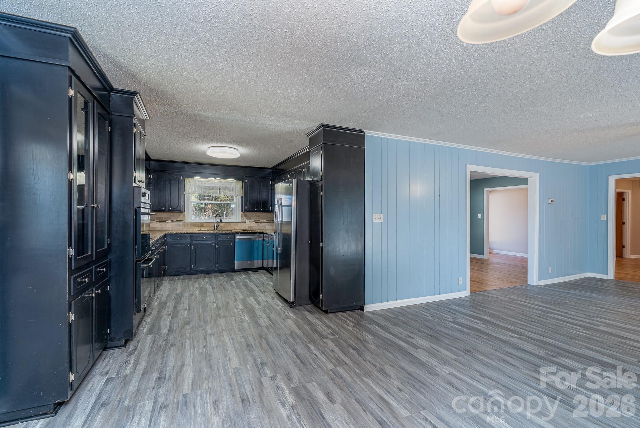 3439 Filbert Highway Clover, SC 29710 - Photo 12 of 28 a view of a kitchen cabinets and wooden floor