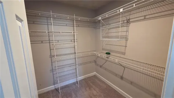 a room with window and a ceiling fan