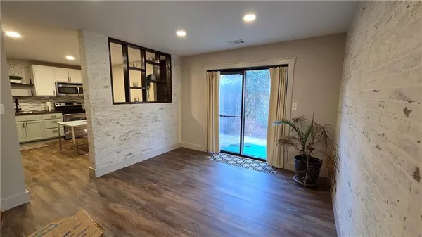 a bed room with a bed and a window