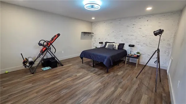 a bathroom with a sink and mirror