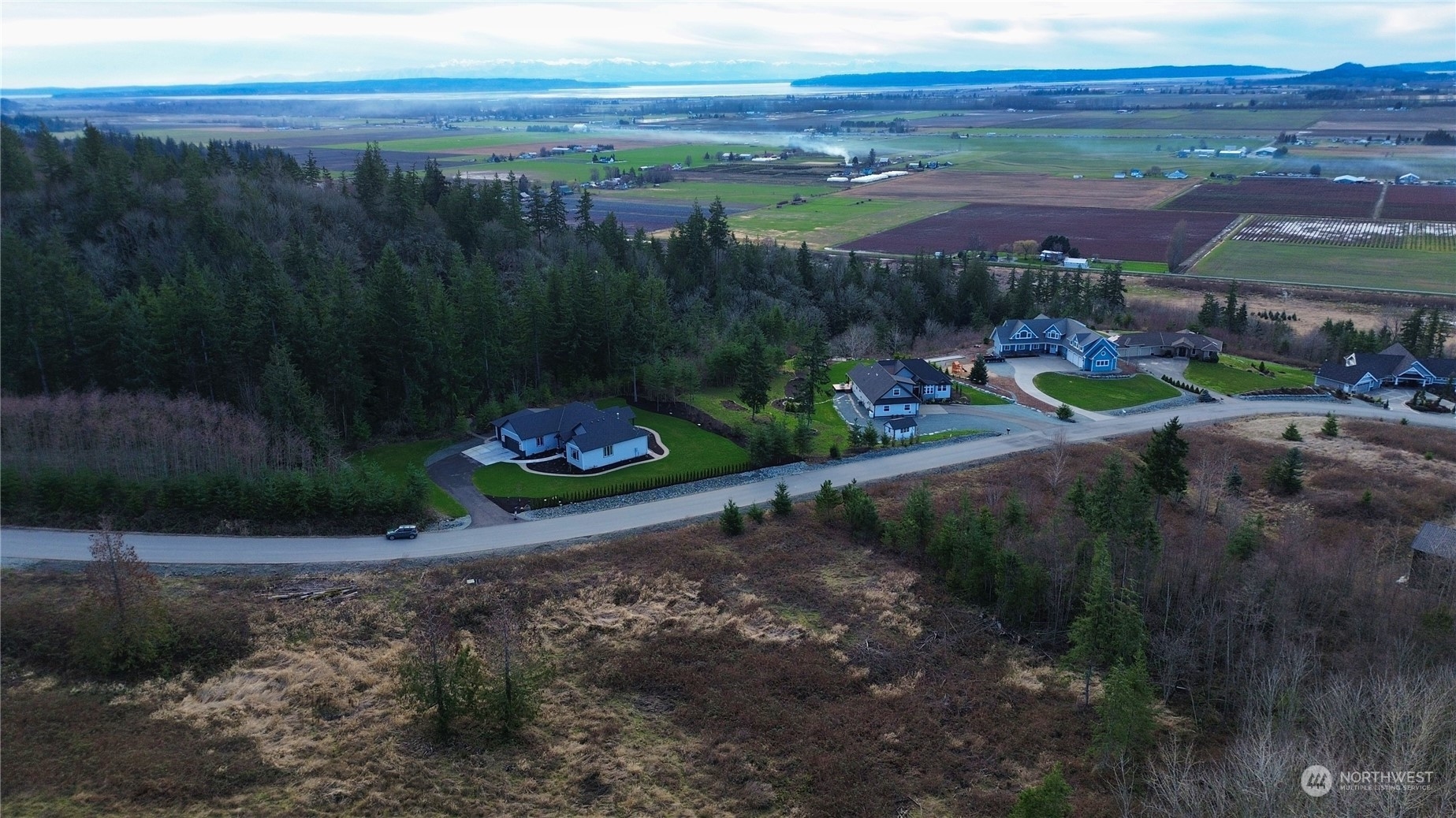 0 Benson Ridge Mount Vernon, WA 98274 - Photo 18 of 20 a view of a town with an outdoor space