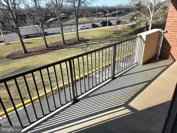 a view of swimming pool from a balcony