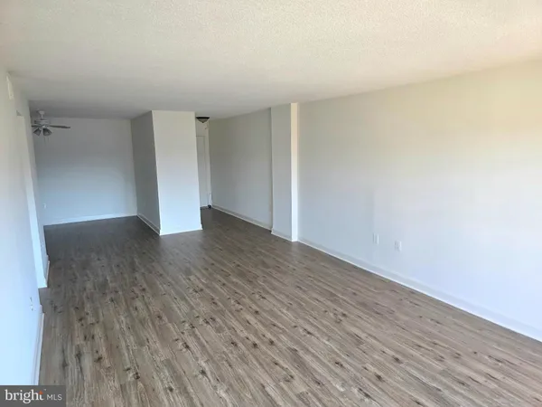 a view of balcony with wooden floor