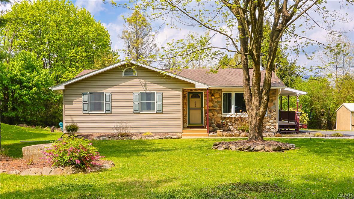 921 Point Phillips Road Bath, PA 18014 - Photo 1 of 29 a front view of house with yard and green space