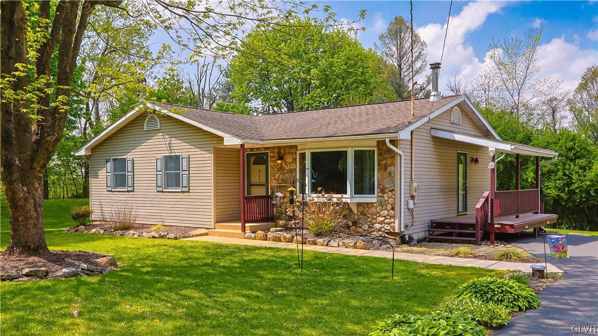 921 Point Phillips Road Bath, PA 18014 - Photo 23 of 29 a front view of house with yard and green space