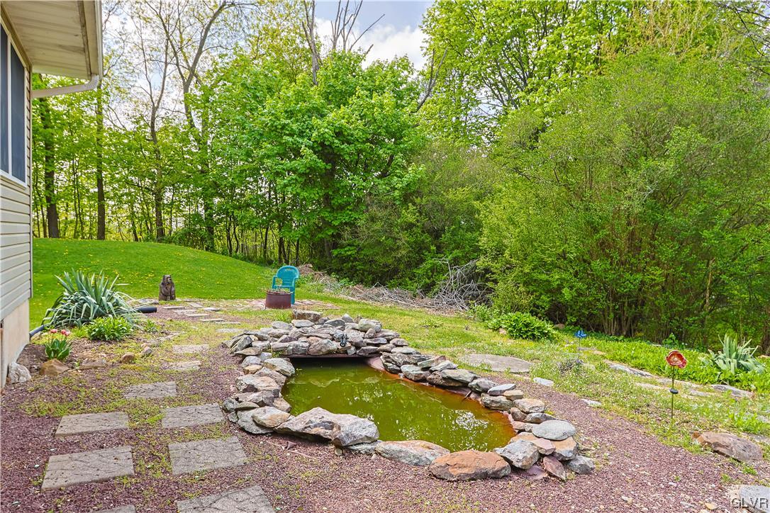 921 Point Phillips Road Bath, PA 18014 - Photo 27 of 29 a view of a swimming pool with a yard