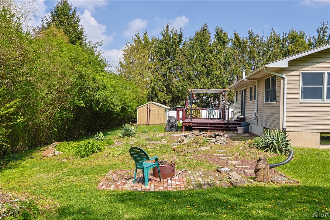921 Point Phillips Road Bath, PA 18014 - Photo 29 of 29 a swimming pool with outdoor seating and yard