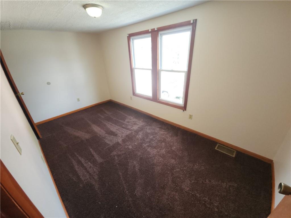 8 Elm Street Bessemer, PA 16112 - Photo 18 of 22 an empty room with a window