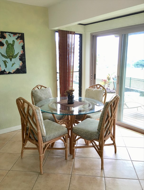 95-789 Ninole Loop Road, Unit 42 Naalehu, HI 96772 - Photo 3 of 17 a dining room with furniture and window
