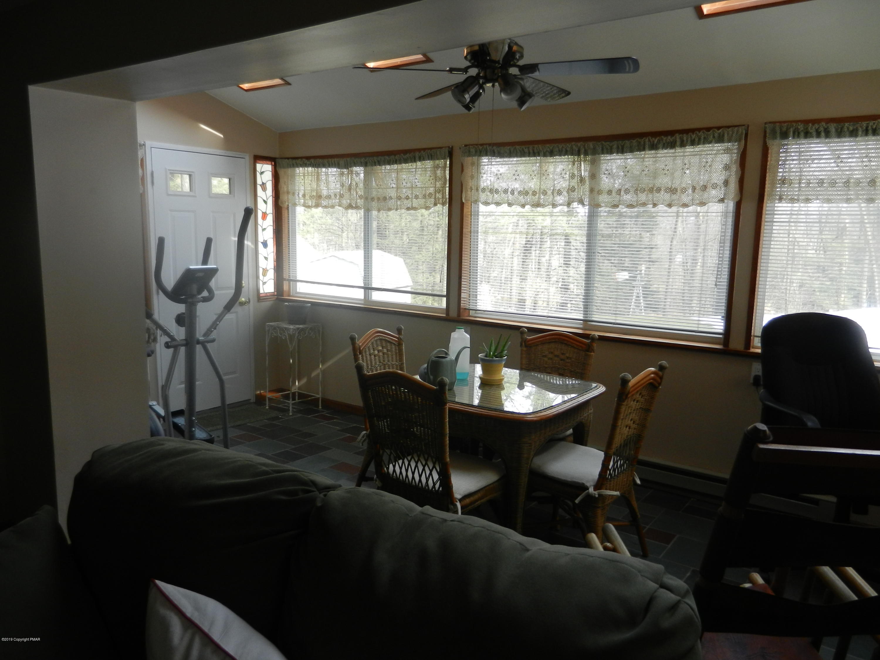 427 Emery Wheel Road Stroudsburg, PA 18360 - Photo 18 of 21 a view of a dining room with furniture window and outside view