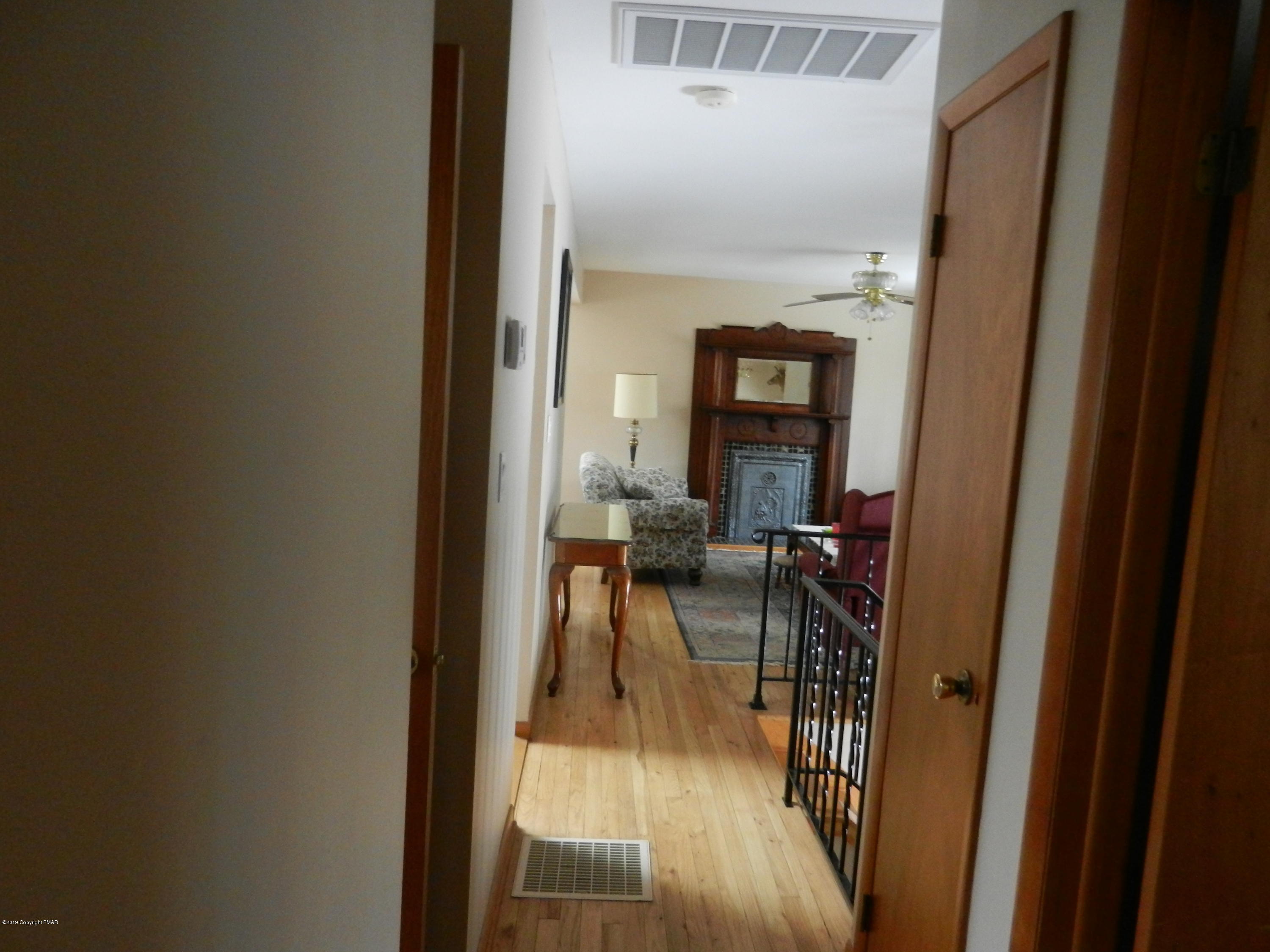 427 Emery Wheel Road Stroudsburg, PA 18360 - Photo 20 of 21 a view of a dining room with a table and chairs