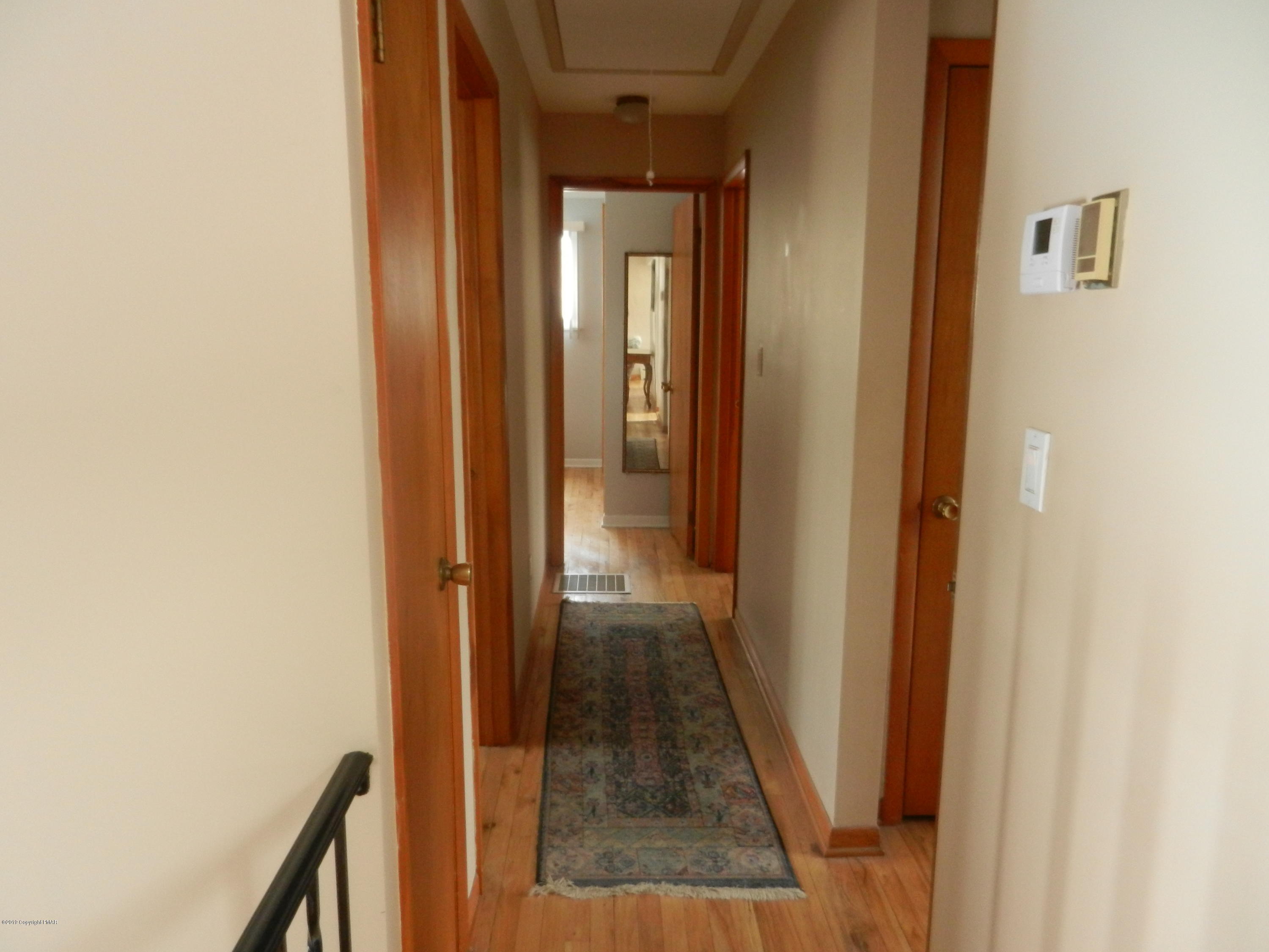 427 Emery Wheel Road Stroudsburg, PA 18360 - Photo 10 of 21 a view of a bathroom from a hallway