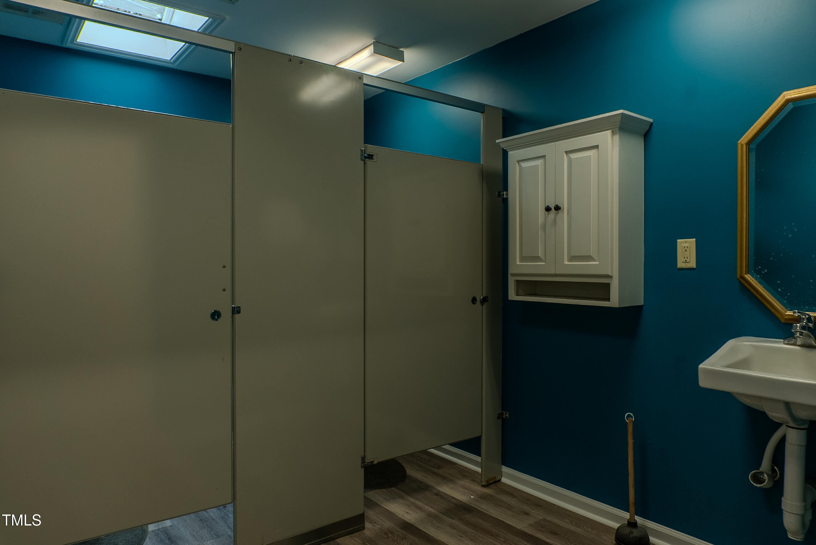 6504 Burlington Road Whitsett, NC 27377 - Photo 19 of 34 a bathroom with a shower