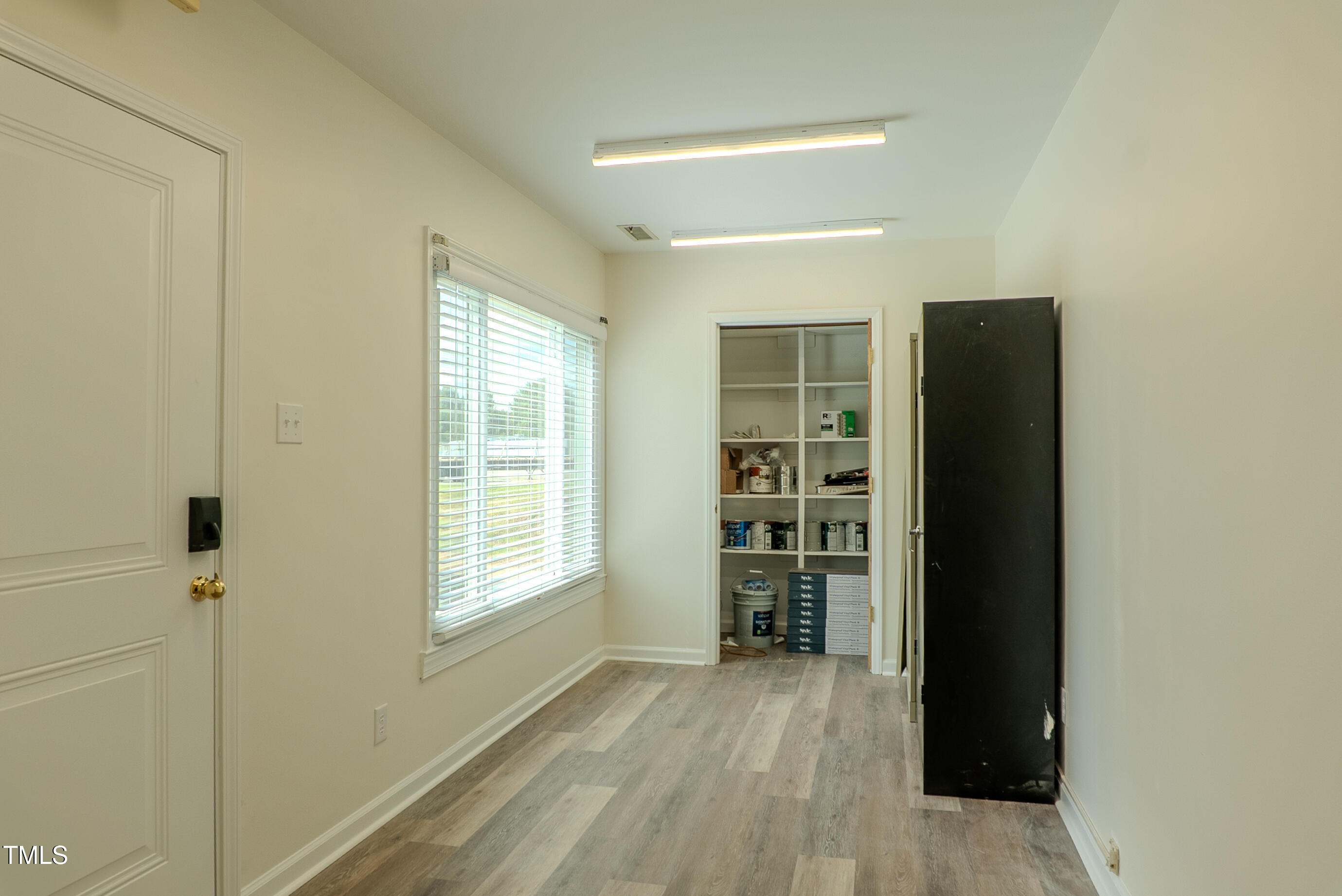 6504 Burlington Road Whitsett, NC 27377 - Photo 23 of 34 a view of an empty room with a window