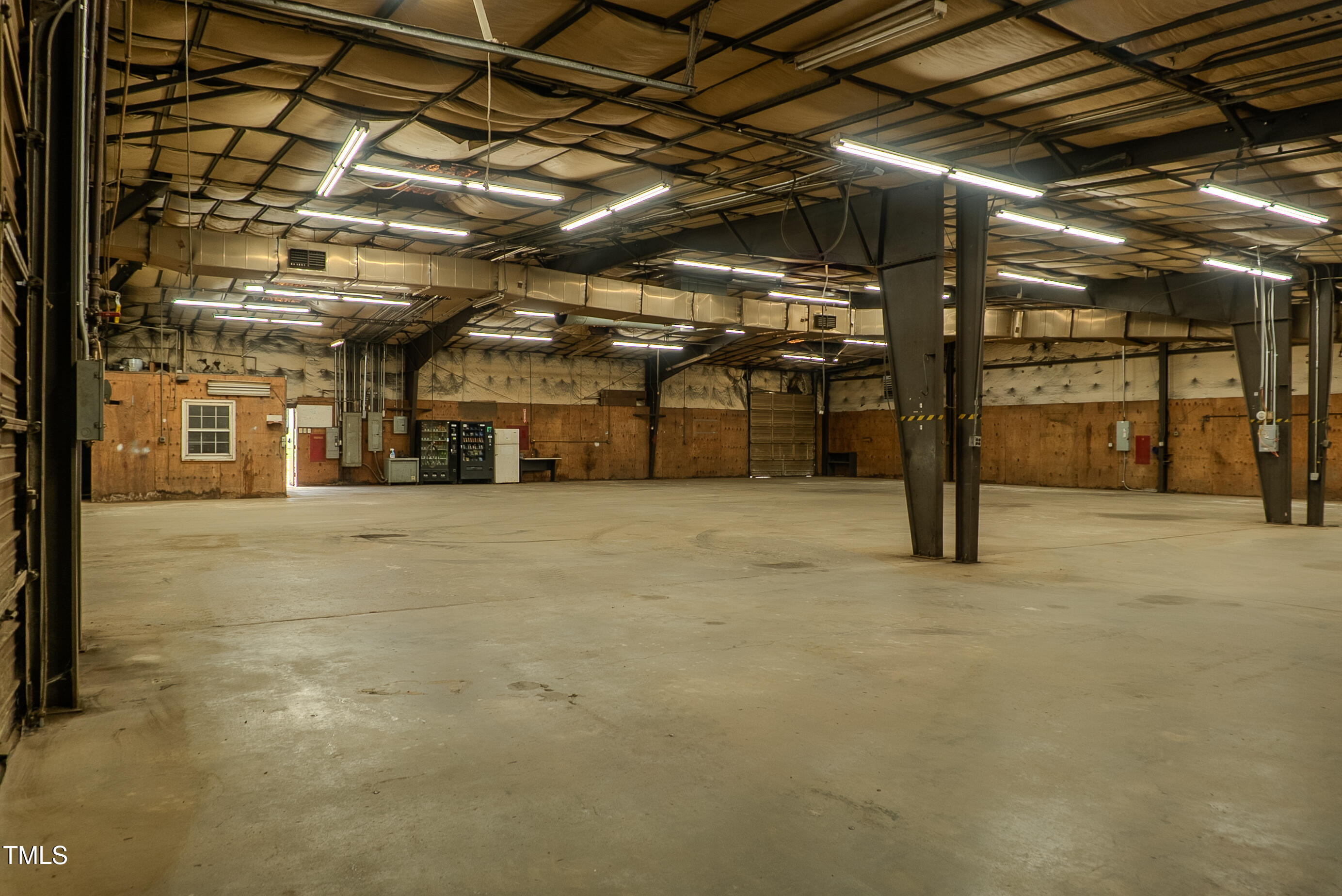 6504 Burlington Road Whitsett, NC 27377 - Photo 26 of 34 a view of a parking area