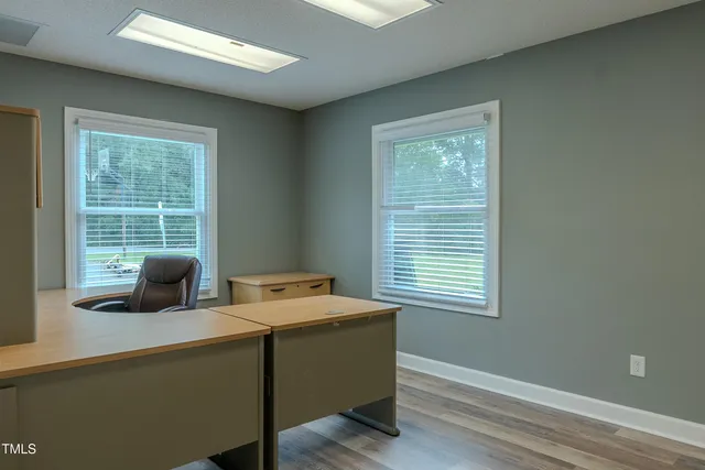 a room with furniture and window