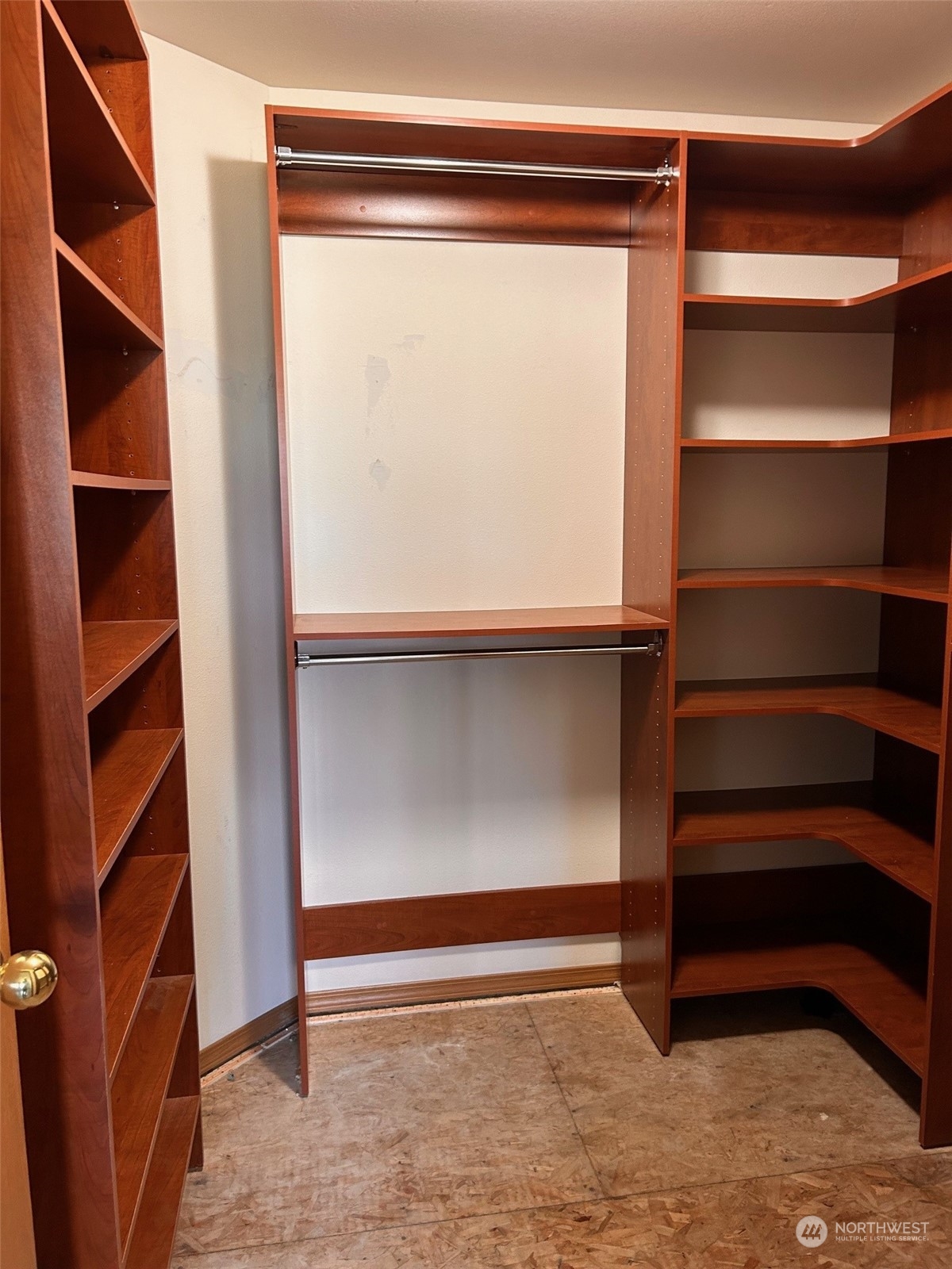 9520 185th Avenue Southwest Rochester, WA 98579 - Photo 18 of 24 a view of walk in closet with empty racks