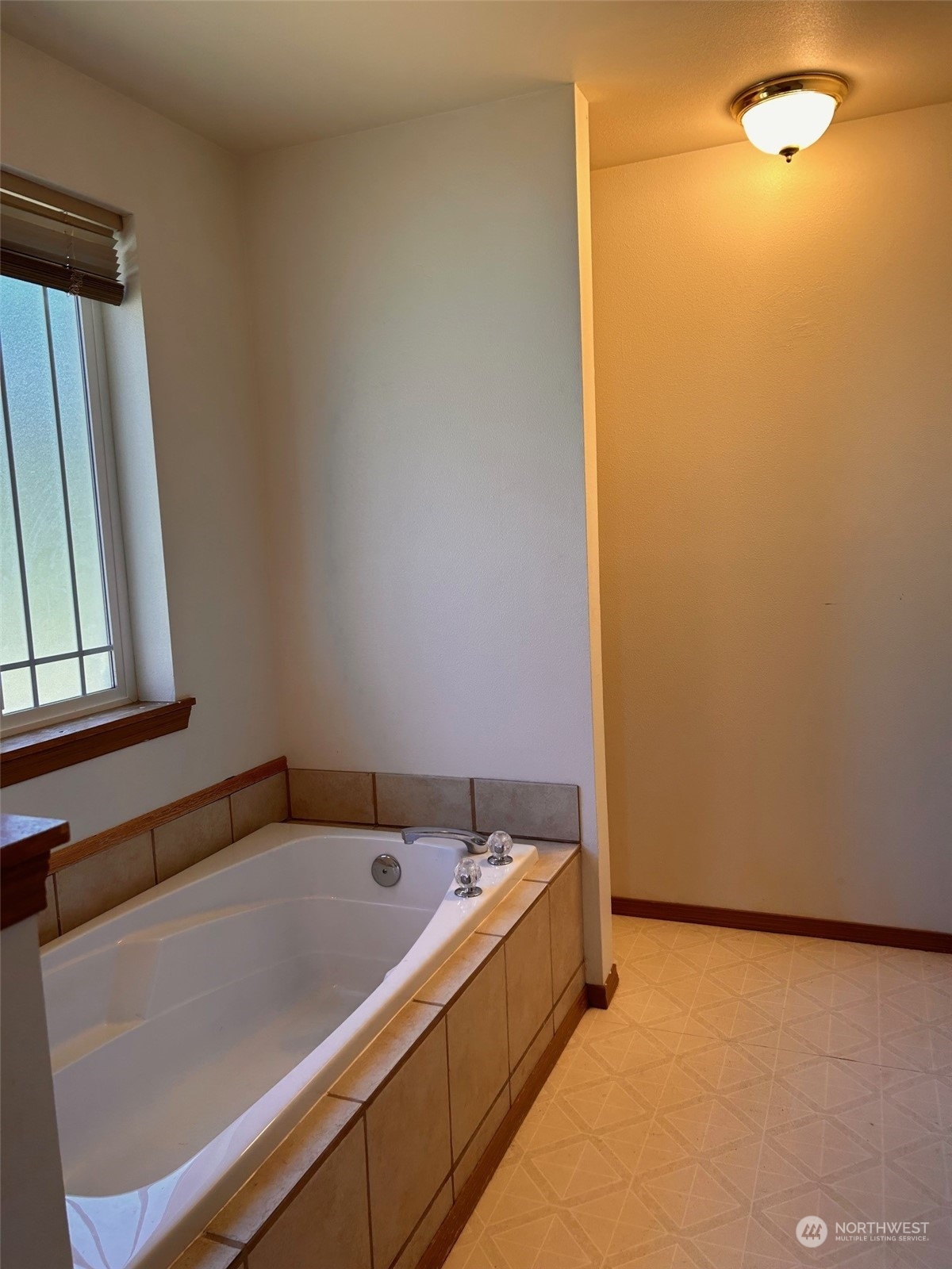 9520 185th Avenue Southwest Rochester, WA 98579 - Photo 21 of 24 a view of bathroom with bathtub