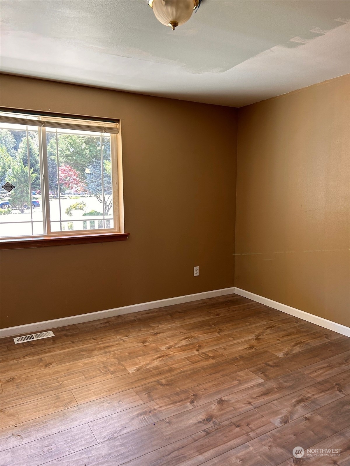 9520 185th Avenue Southwest Rochester, WA 98579 - Photo 24 of 24 a view of an empty room with a window