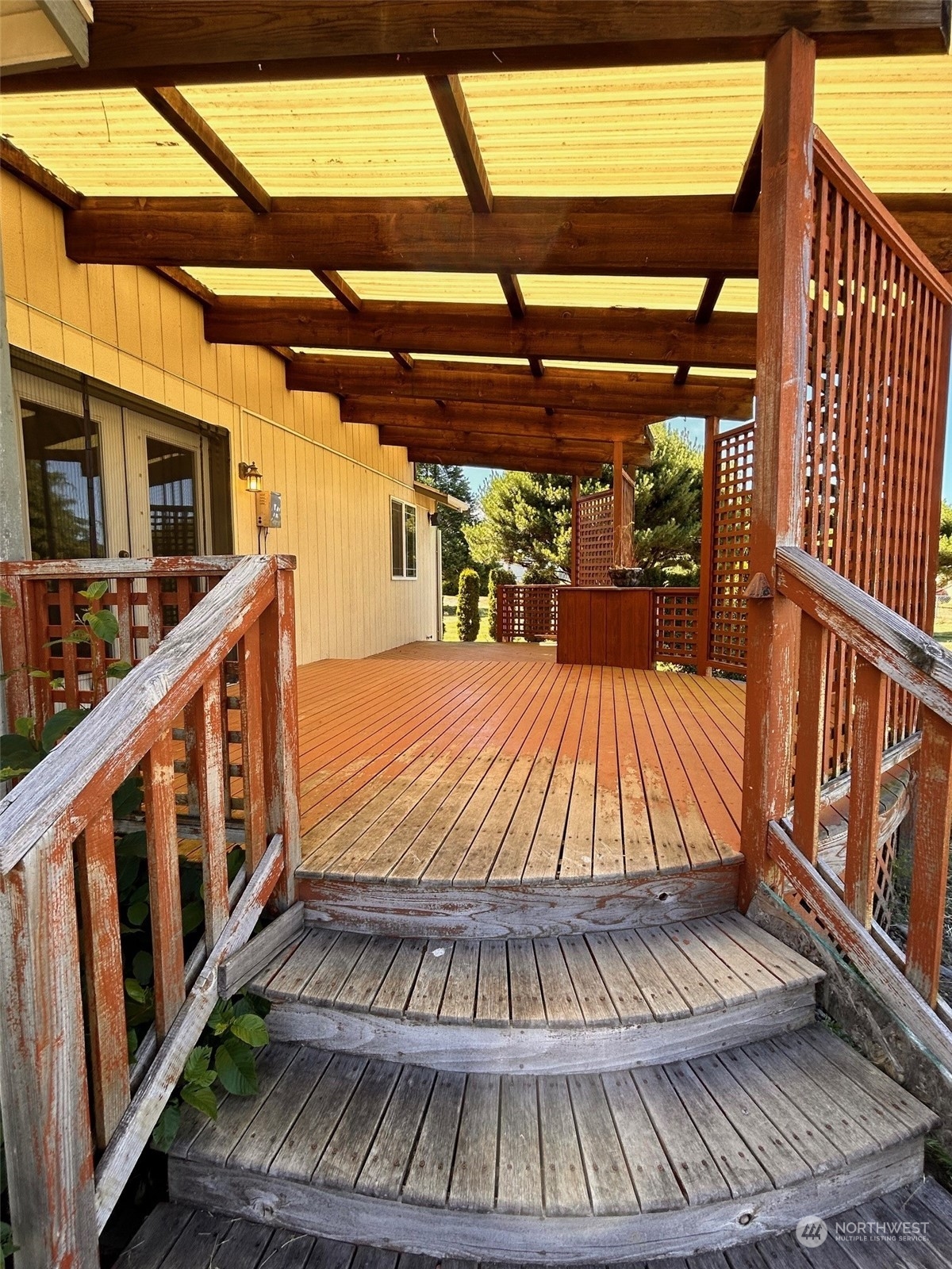 9520 185th Avenue Southwest Rochester, WA 98579 - Photo 5 of 24 a view of outdoor space with deck and furniture