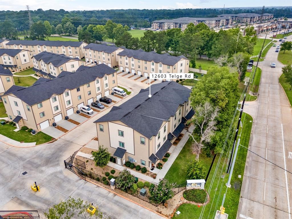 12603 Telge Road, Unit 32 AD Cypress, TX 77429 - Photo 13 of 13 aerial view of a house with a yard