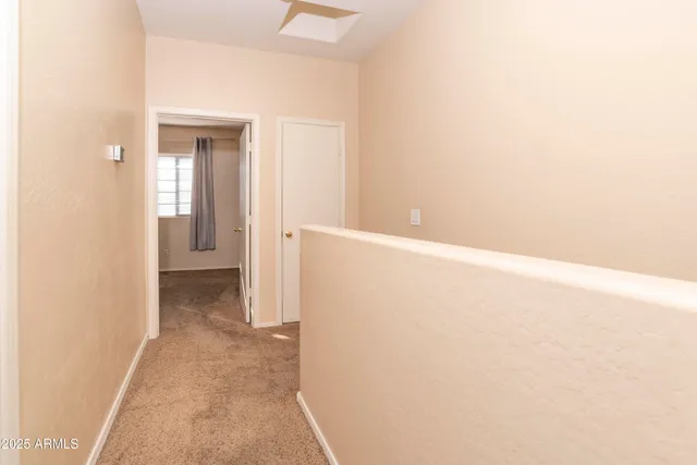 a view of a room with an empty space