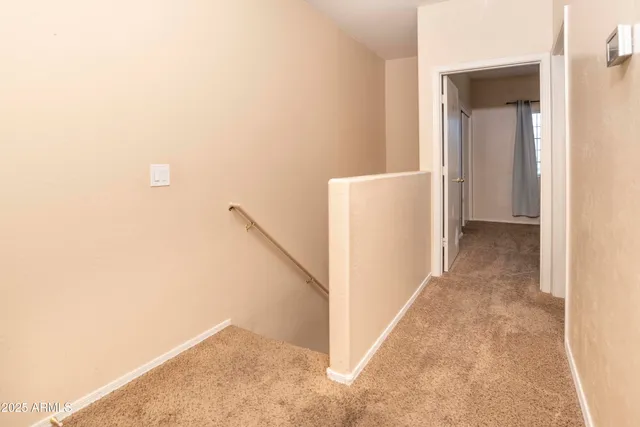 a view of a hallway with closet