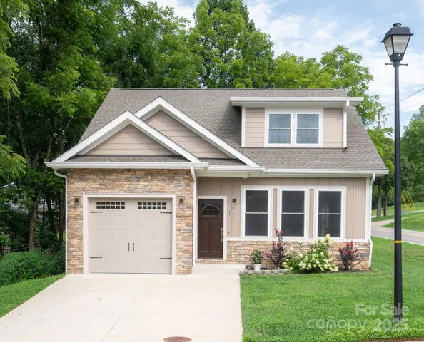 a house with garden in front of it