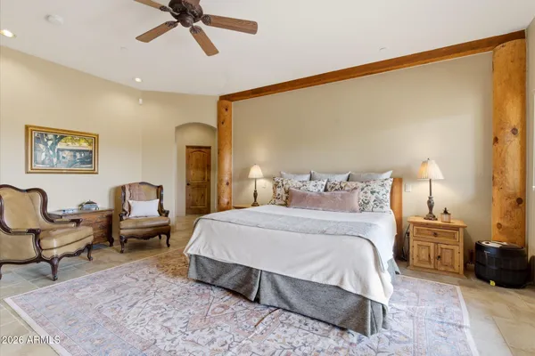 a bedroom with a bed and furniture