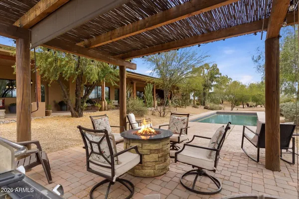 a view of an ocean with city and mountain view