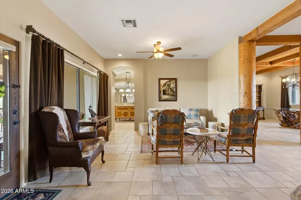 a living room with furniture and a window