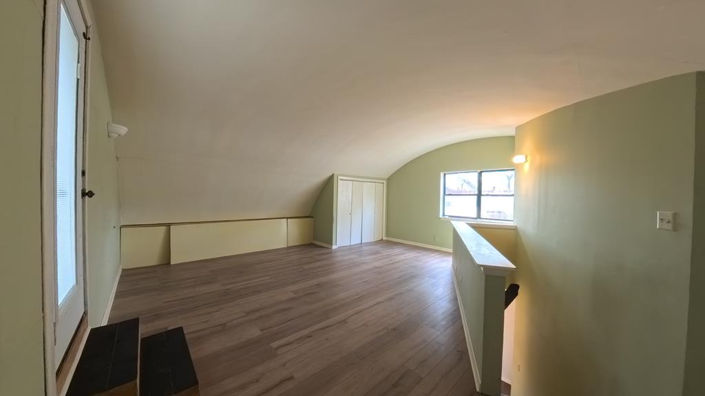 929 Red Bluff Road Pipe Creek, TX 78063 - Photo 16 of 29 a view of empty room with wooden floor and fan