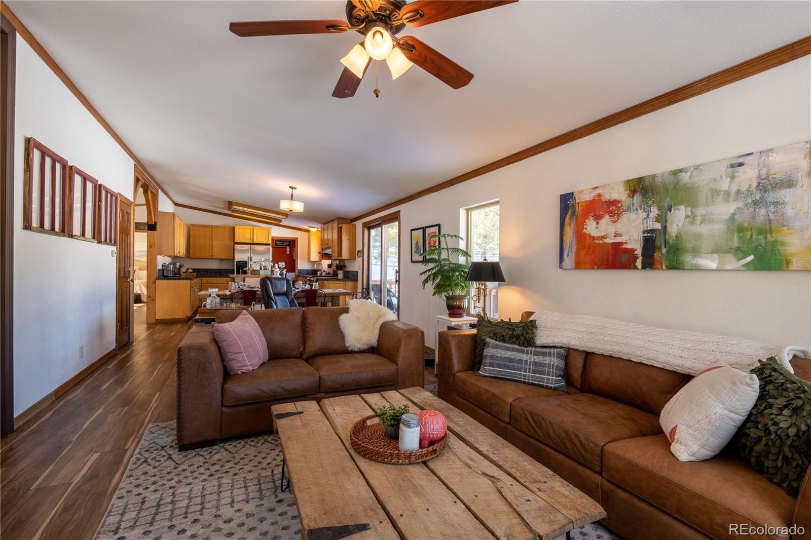 233 Ridge Road Ward, CO 80481 - Photo 12 of 36 a living room with furniture and a ceiling fan