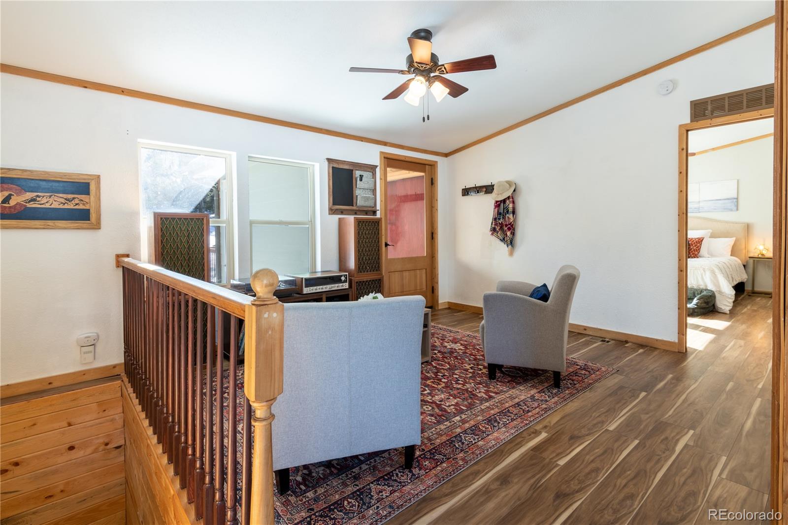 233 Ridge Road Ward, CO 80481 - Photo 4 of 36 a living room with furniture wooden floor and a window