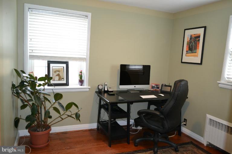 3013 Dunran Road Baltimore, MD 21222 - Photo 13 of 19 a view of a workspace with furniture and a window