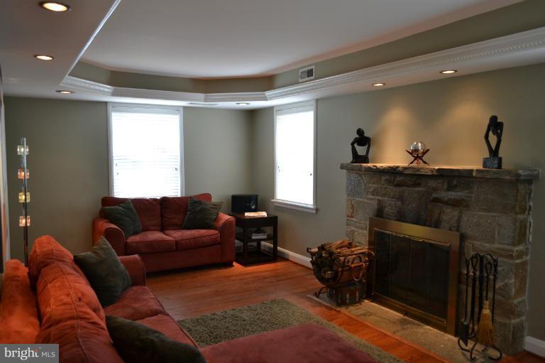 3013 Dunran Road Baltimore, MD 21222 - Photo 5 of 19 a living room with furniture and a fireplace