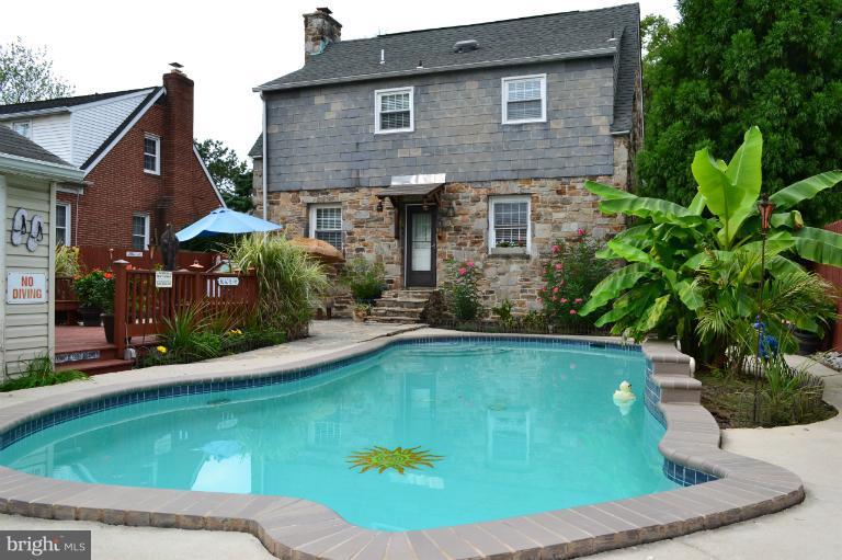 3013 Dunran Road Baltimore, MD 21222 - Photo 7 of 19 a view of a house with pool