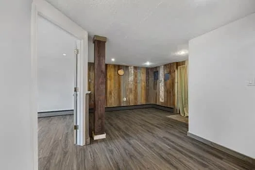 a view of hallway with a wooden floor