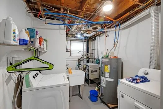 a utility room with dryer and washer