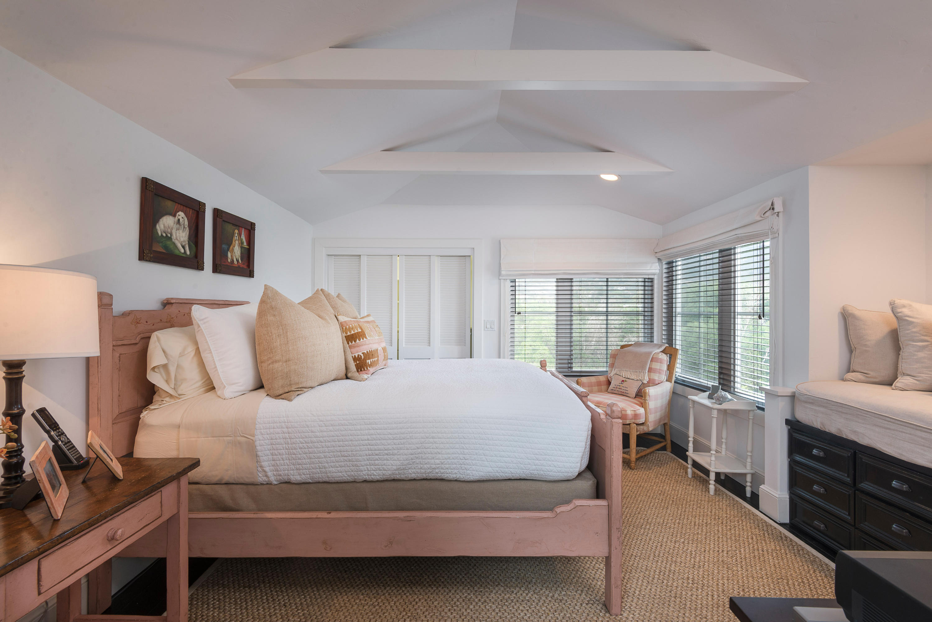 3555.5 Padaro Lane Carpinteria, CA 93013 - Photo 11 of 20 a bedroom with a large bed and a large window