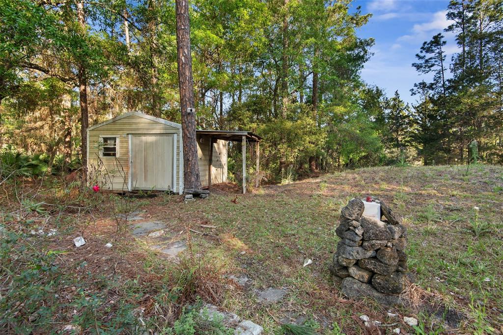 4544 Butternut Avenue Bunnell, FL 32110 - Photo 35 of 42 a view of a house with a backyard