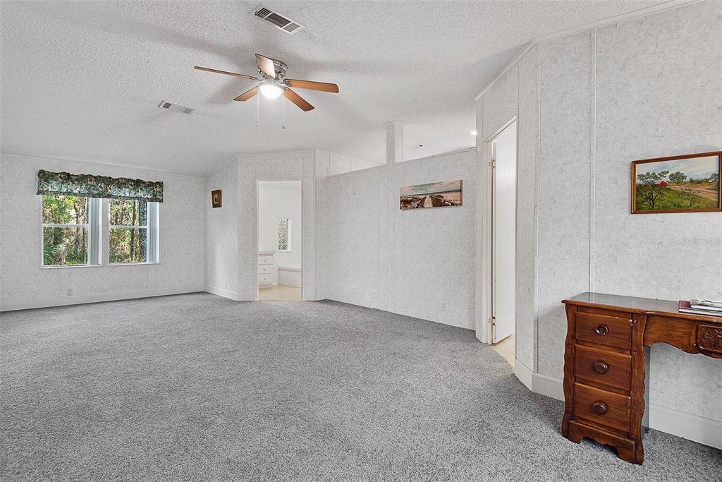 4544 Butternut Avenue Bunnell, FL 32110 - Photo 10 of 42 a view of an empty room with a window