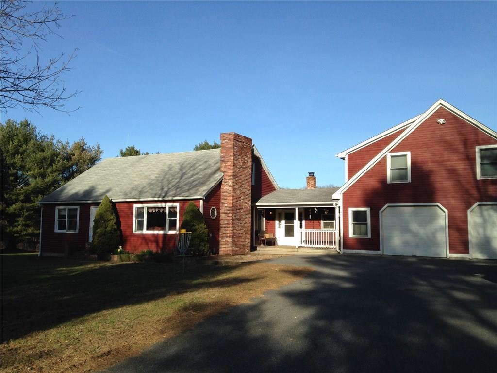 294 Quasset Road Pomfret, CT 06259 - Photo 1 of 1 a front view of a house with a yard