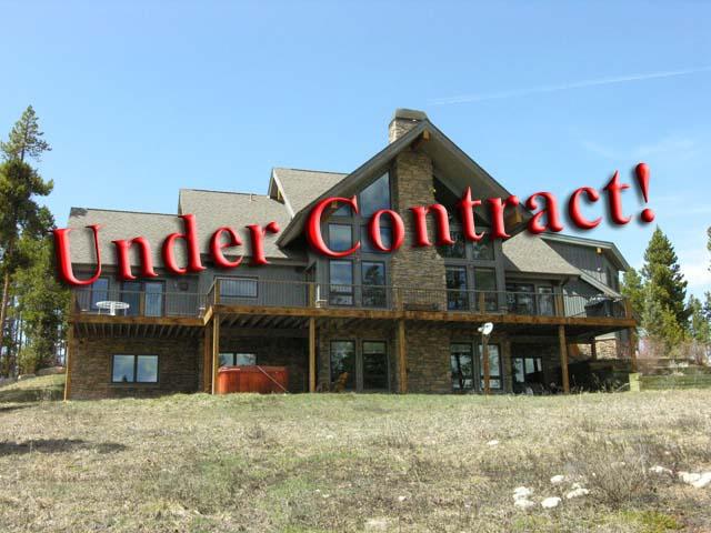 87 Ridge Road Tabernash, CO 80478 - Photo 1 of 13 a view of street with shops