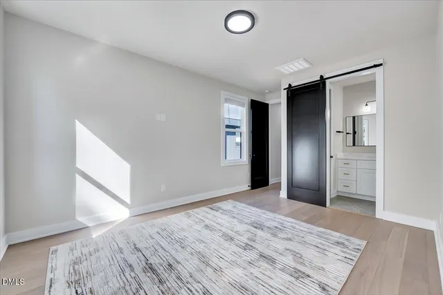 a view of a livingroom with wooden floor