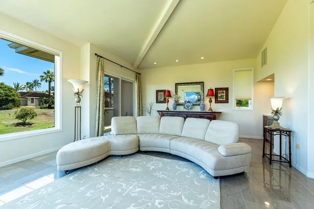 a view of kitchen with stainless steel appliances granite countertop a stove and a sink